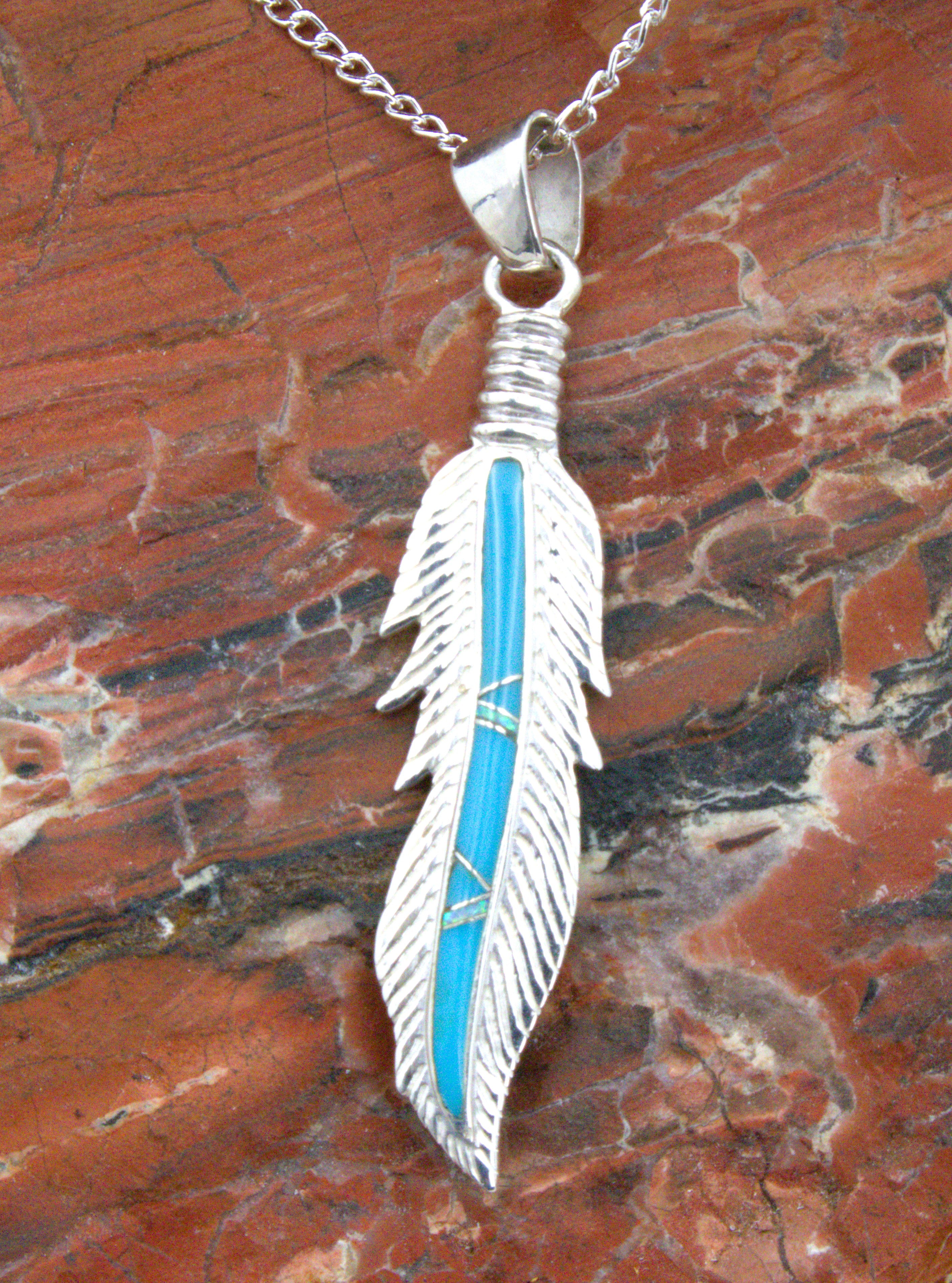 Sterling Silver Turquoise Feather Pendant PO34