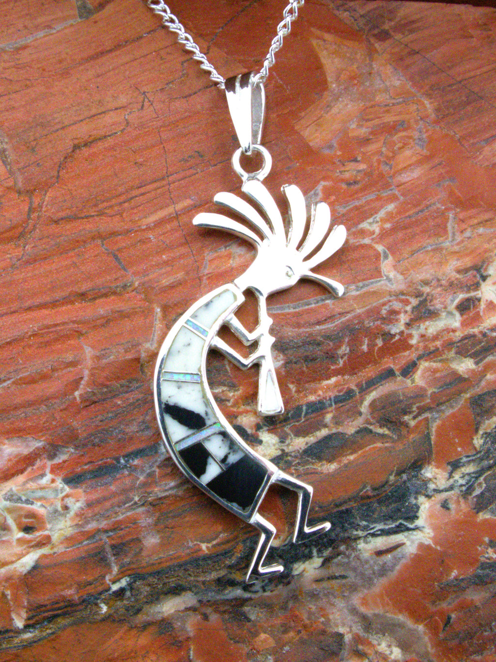 White Buffalo Turquoise Kokopelli Pendant