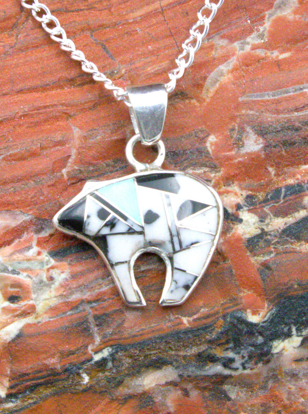 White Buffalo Turquoise Stylized Bear Pendant